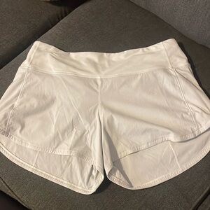 White lululemon 4inch mid rise speed ups
